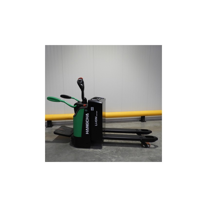 Pallet truck with platform and barriers